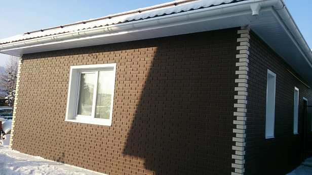 Облицовка  дома из газоблоков фасадными панелями