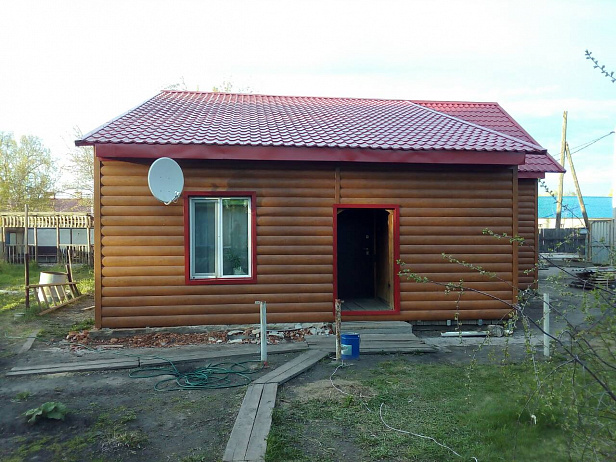 Облицовка фасада дома в п. Богандинский - Монтаж металлосайдинга и откосов
